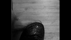 Stepping on his cock and making it cum Thumb