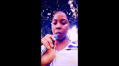 Ebony Girl smoking Sisha Outdoors and Fucking an Eggplant Thumb