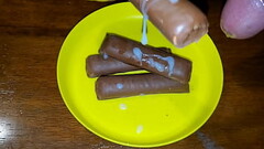 Twix covered in my Cum look so good. Which one should I eat first the right or the left. Thumb