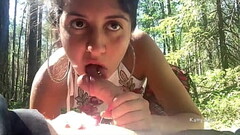 Young whore sucked a stranger in the woods in public Thumb