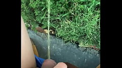 Pissing with my shorts on while walking the dog Thumb