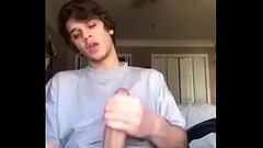 Sexy jock jerks off his huge cock on camera Thumb