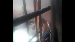 Beautiful teen, African student taking bath outside during daylight Thumb