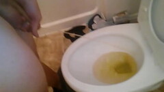 Pissing in the toilet Thumb