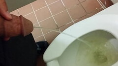 Pissing in another public toilet. Thumb