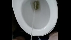 man pissing in toilet Thumb