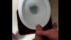 Toilet pissing Thumb