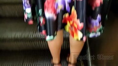upskirt at brunette in black g-string Thumb